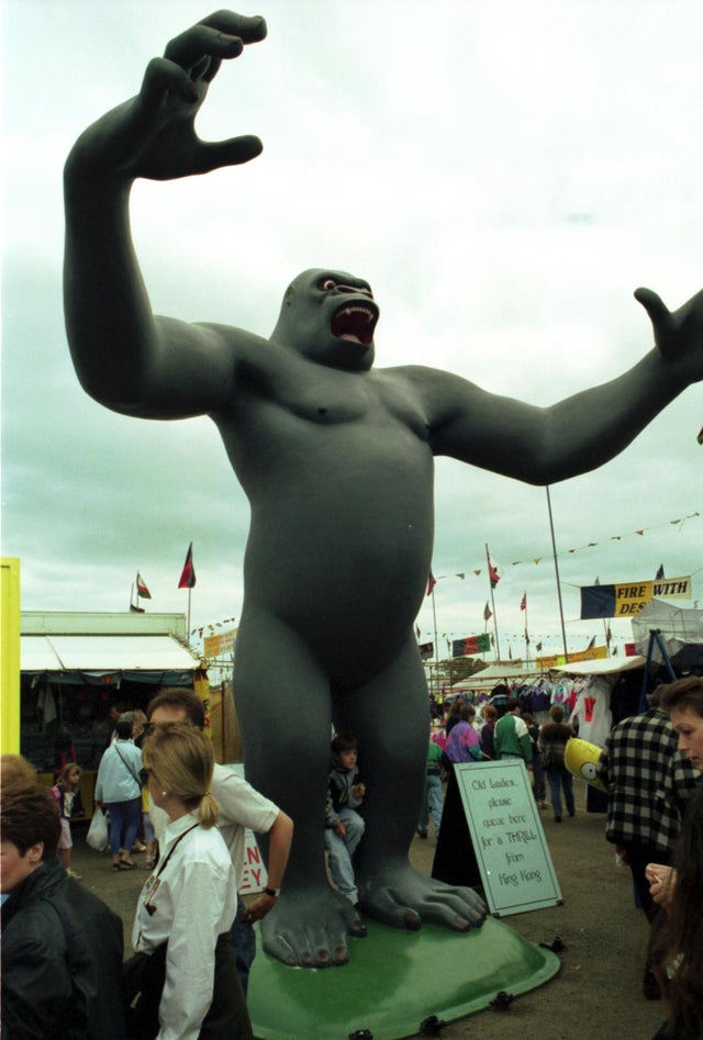 The giant King Kong figure towers over bargain hunters at Ingliston Sunday Market near Edinburgh, July 1991.