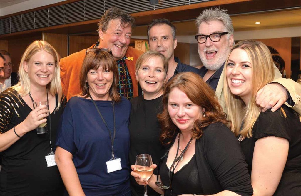 David Johnson with Stephen Fry, John Mackay and production/publishing team members Katya Shipster, Sharon Burgess, Ali Day, Sally Homer and Kimberley Atkins at the Royal Festival Hall in 2014. Photo: Steve Ullathorne